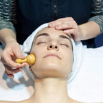 Rouleau de Massage en Bois Visage